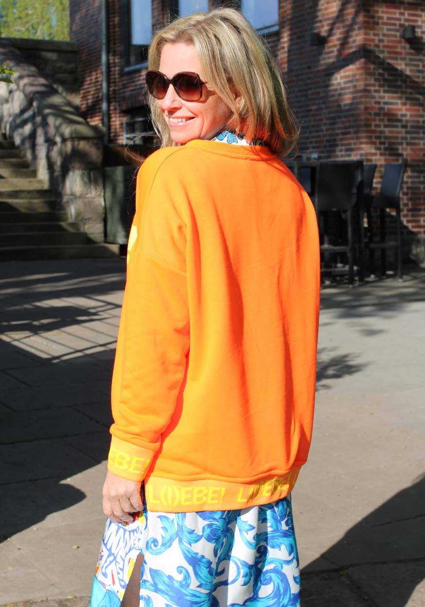 Miss Goodlife V-Neck L(i)ebe Glitter – neonorange JETZT KAUFEN