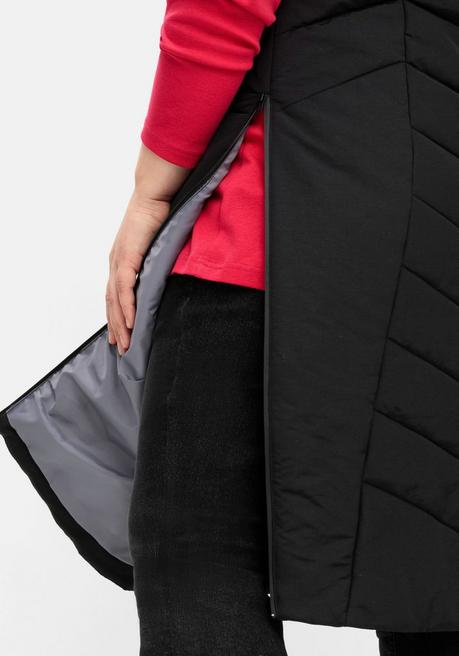 sheego Lange Steppweste mit Kapuze und seitlichen Zippern - schwarz sheego JETZT KAUFEN