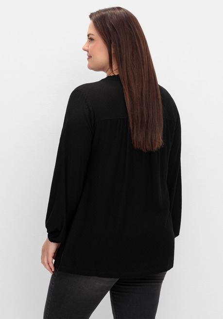 sheego Tunika mit V-Schlitz, Rüsche und Bindeband - schwarz sheego Sonderangebot