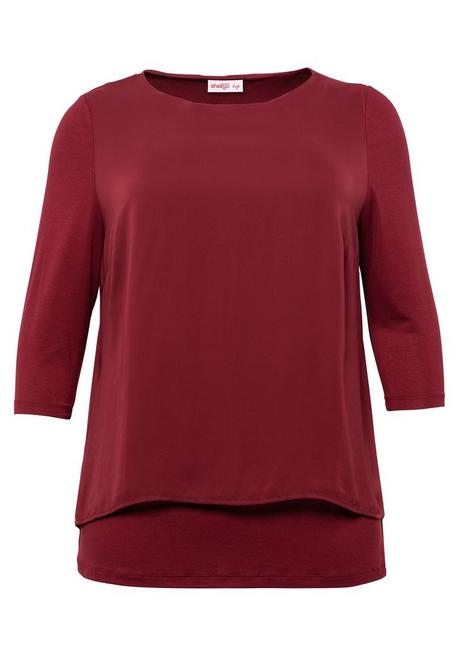 sheego Blusenshirt in leichter A-Linie mit Zipfelsaum - rubinrot sheego Tiefpreis