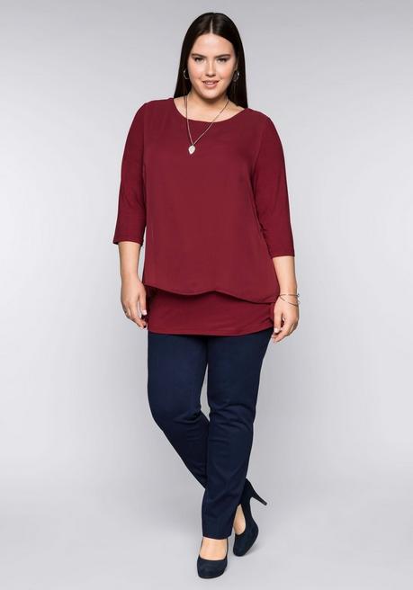 sheego Blusenshirt in leichter A-Linie mit Zipfelsaum - rubinrot sheego Tiefpreis
